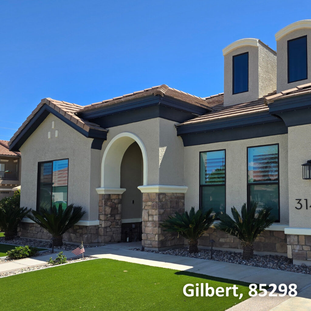 Black Vinyl Desert Mountain Single Slider, Single Hung, and Picture Windows in Stucco Home in Gilbert, AZ 85298